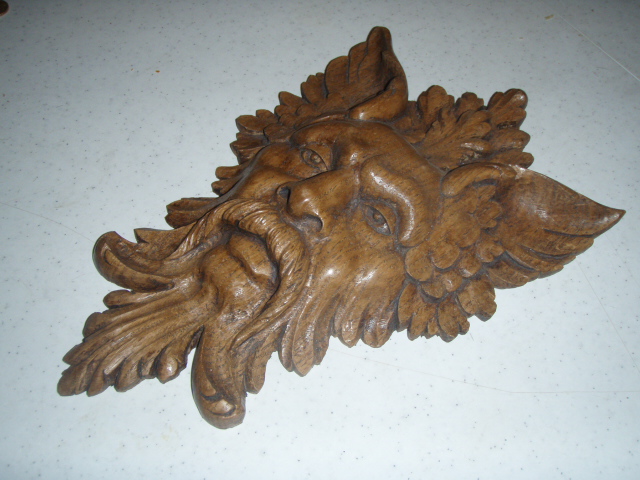 sculpteur animalier sur bois